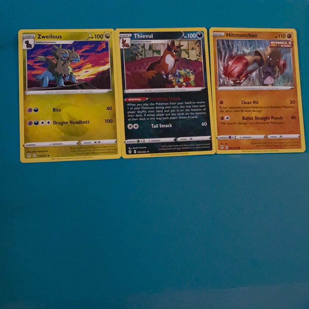 Three Pokémon Cards